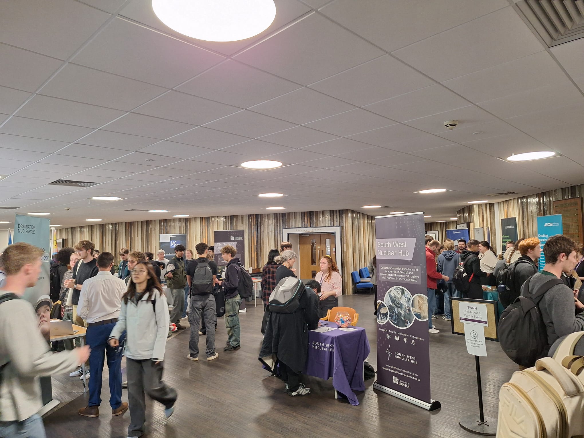 Group of Students milling round employer stands